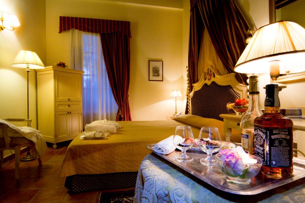 Łóżko lub łóżka w pokoju w obiekcie Castello di Leonina Relais - Adults Only