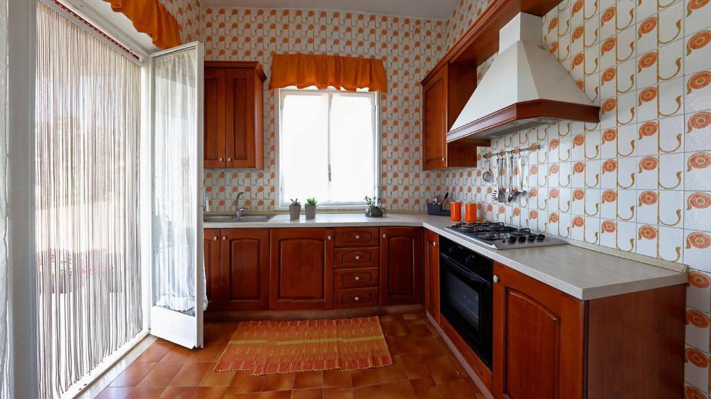 Kuchyňa alebo kuchynka v ubytovaní Villa Araucaria