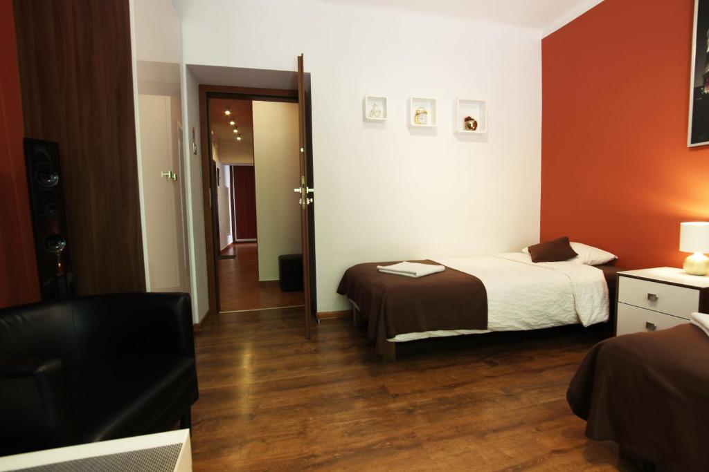 Posteľ alebo postele v izbe v ubytovaní Rainbow Apartments 1