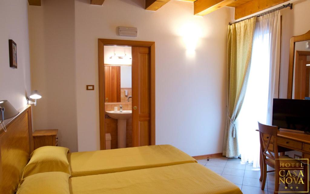 TV a/nebo společenská místnost v ubytování Hotel Casanova