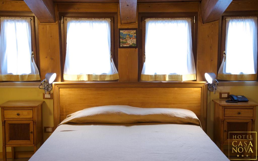 Postel nebo postele na pokoji v ubytování Hotel Casanova