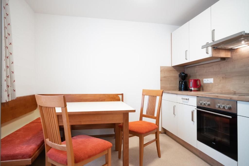 Kuchyňa alebo kuchynka v ubytovaní Seilergasse Apartments by we rent, SUMMERCARD INCLUDED