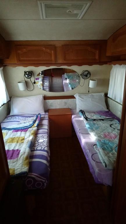 Postel nebo postele na pokoji v ubytování Camping Pitsoni