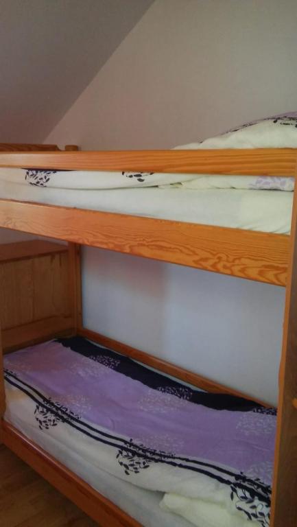 Postel nebo postele na pokoji v ubytování Argo Domki
