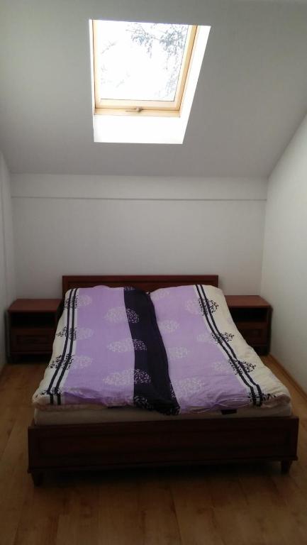 Postel nebo postele na pokoji v ubytování Argo Domki