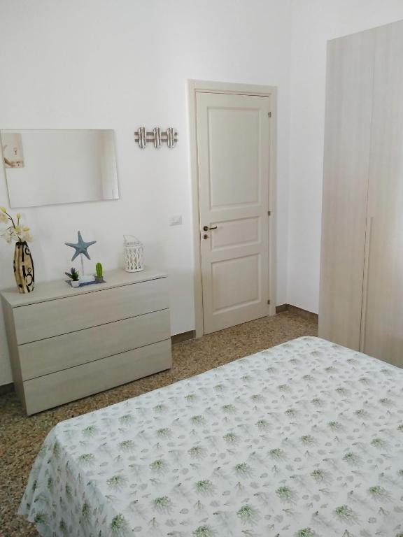 Postel nebo postele na pokoji v ubytování Villa Rollo