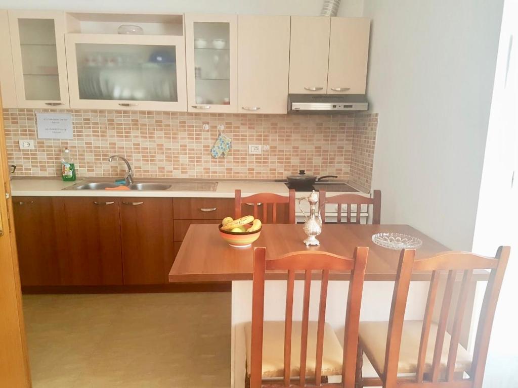 A cozinha ou kitchenette de Sixth Apartment