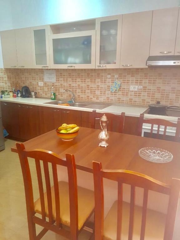 A cozinha ou kitchenette de Sixth Apartment