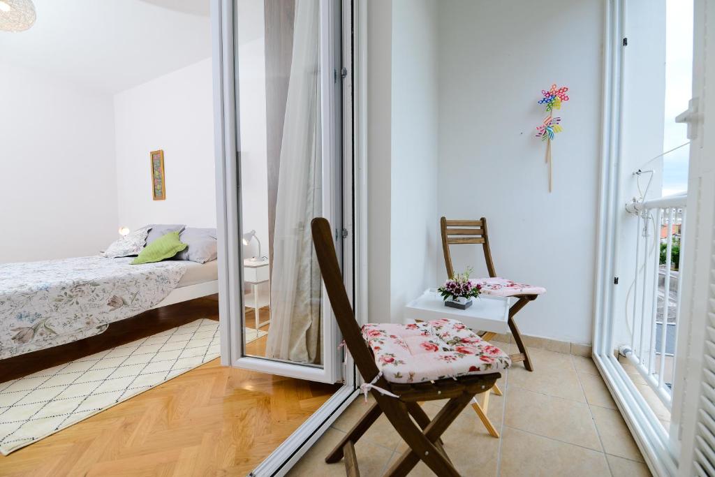 Łóżko lub łóżka w pokoju w obiekcie Apartment Rocky I