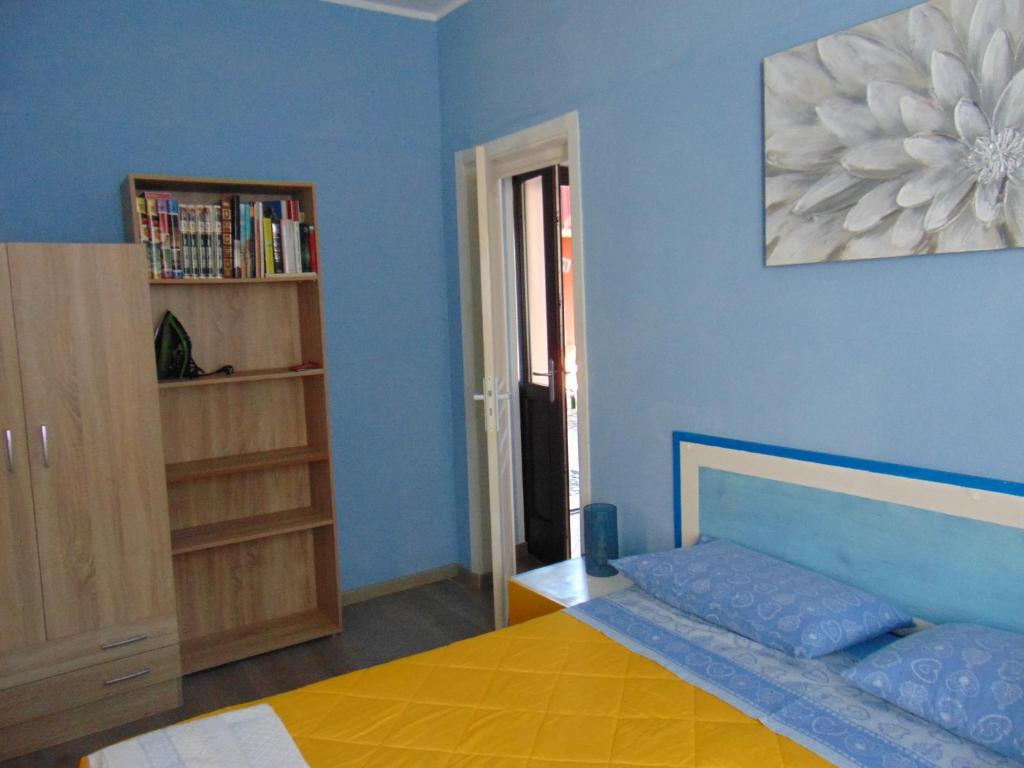 Postel nebo postele na pokoji v ubytování Hortus Lake Orta