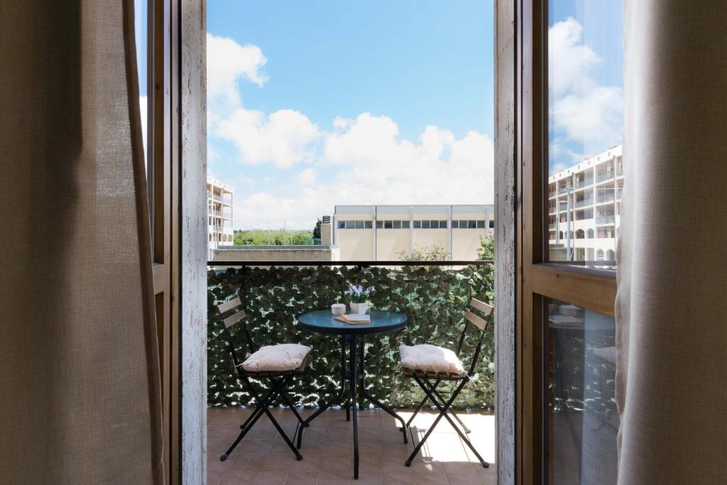 A balcony or terrace at Passi Alterni Apartments
