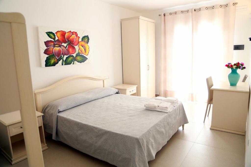 Postel nebo postele na pokoji v ubytování A CASA DI GIUSEPPE