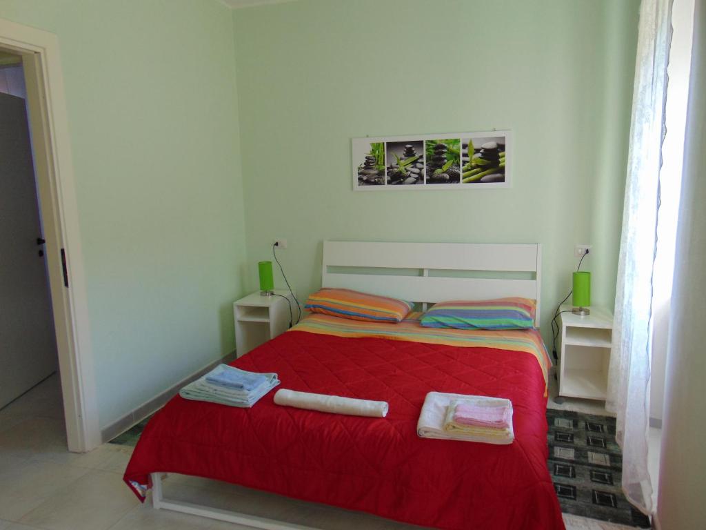 Postel nebo postele na pokoji v ubytování Hortus Lake Orta
