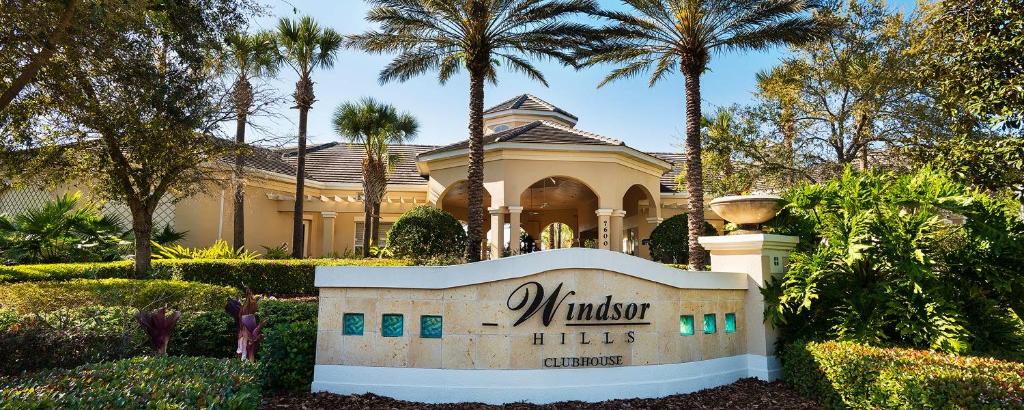 a mansion with a sign in front of a building at Windsor Hills Resort - Enchanted Crystal Castle in Orlando