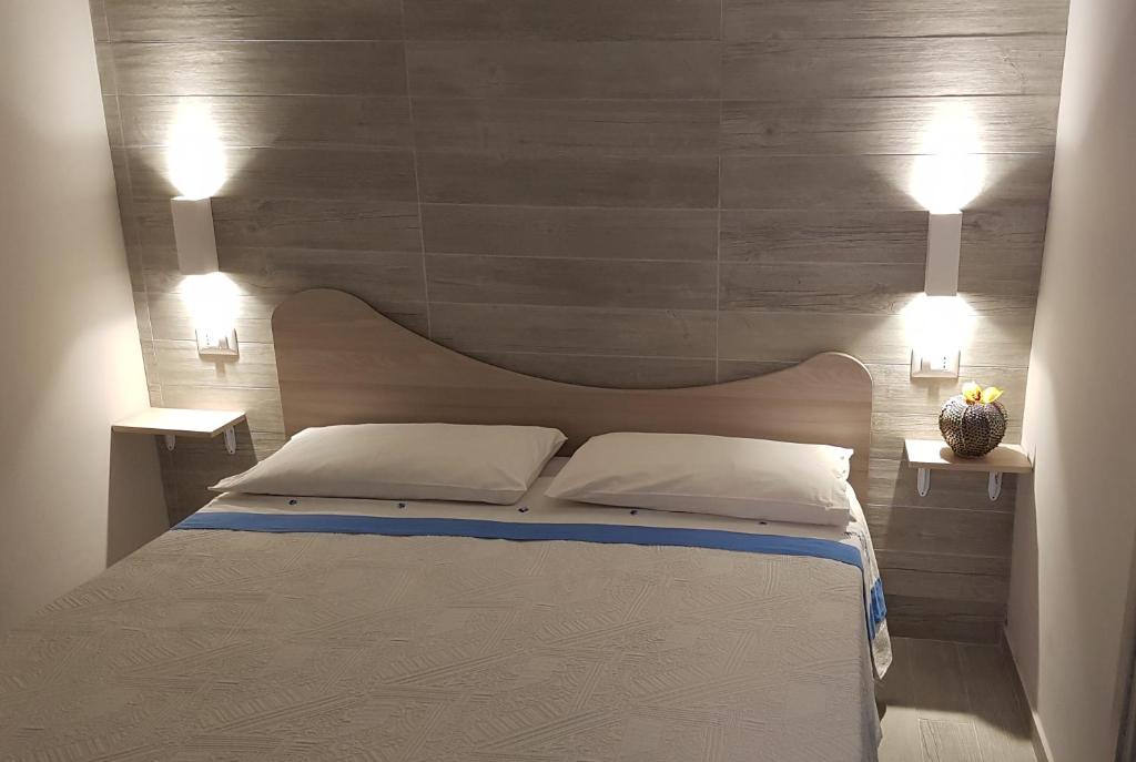 Ένα ή περισσότερα κρεβάτια σε δωμάτιο στο Casa Vacanza Tony