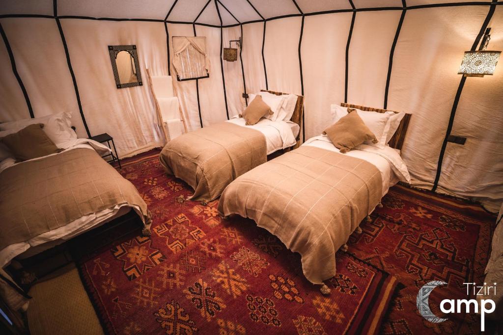 Postel nebo postele na pokoji v ubytování Tiziri Camp