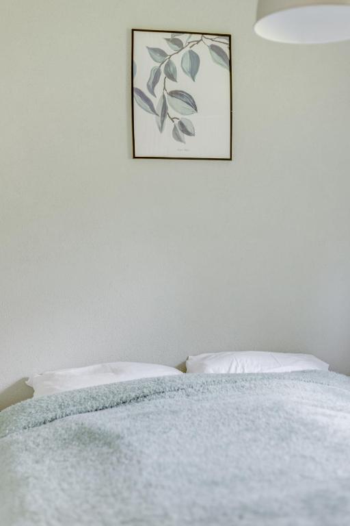 Postel nebo postele na pokoji v ubytování Chalet Descansar op de Veluwe