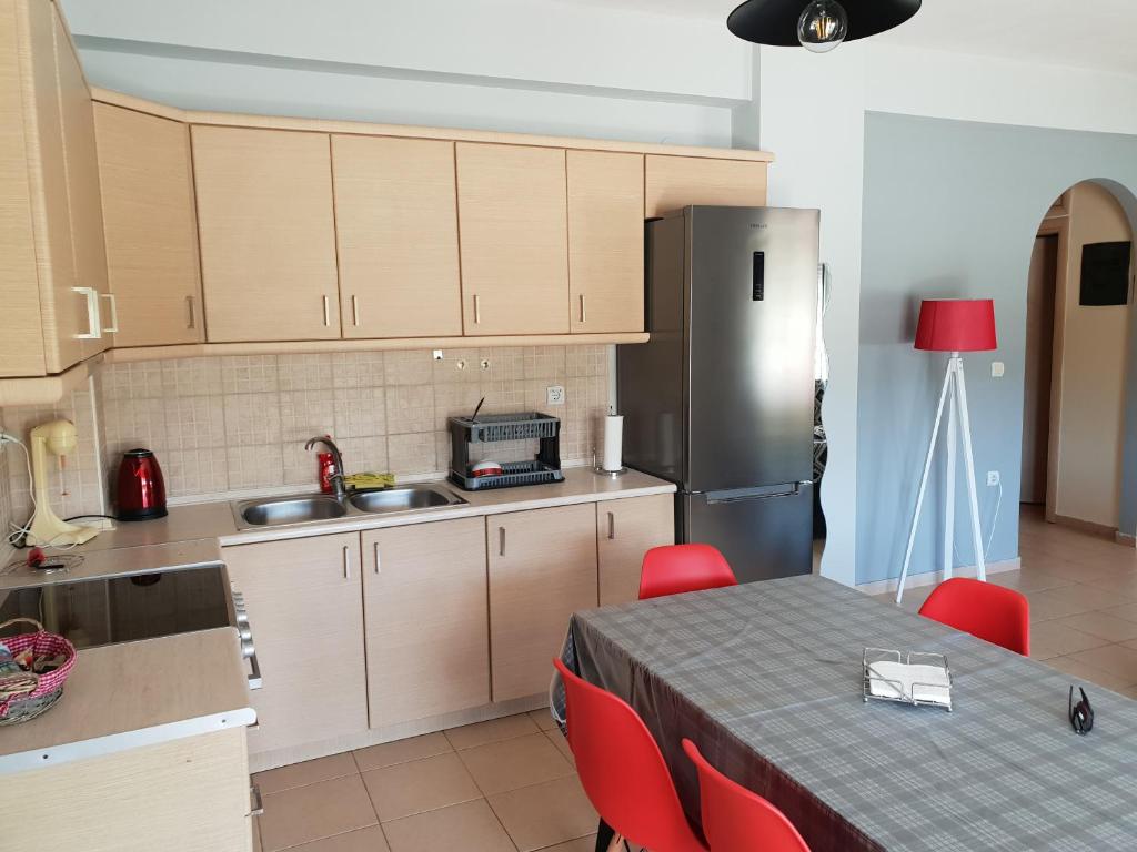 Kuchyň nebo kuchyňský kout v ubytování Eri Apartment