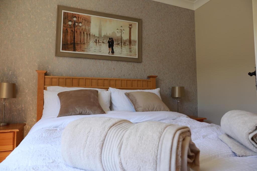 Cama o camas de una habitación en Alices Loft & Cottages