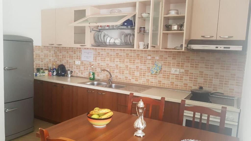 A cozinha ou kitchenette de Sixth Apartment