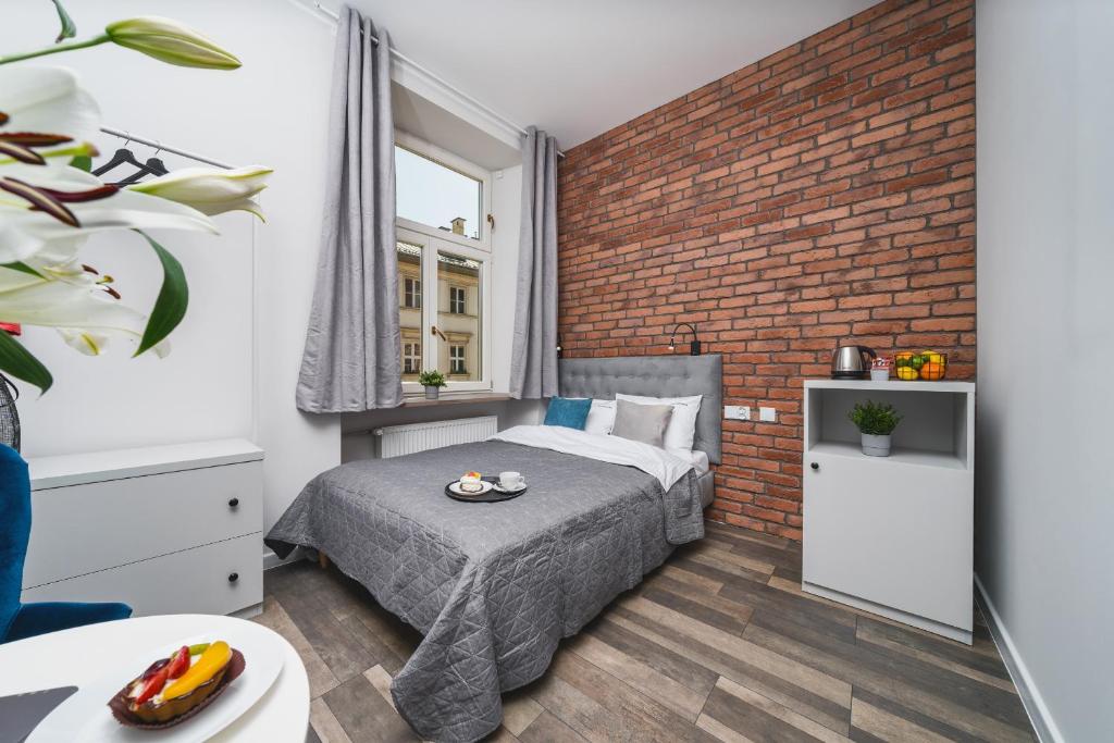 Posteľ alebo postele v izbe v ubytovaní Liv Apartments Old Town