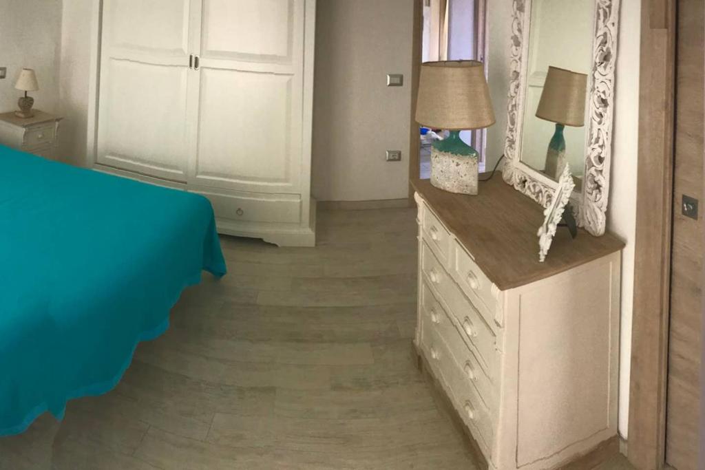 Posteľ alebo postele v izbe v ubytovaní Villa della pietra