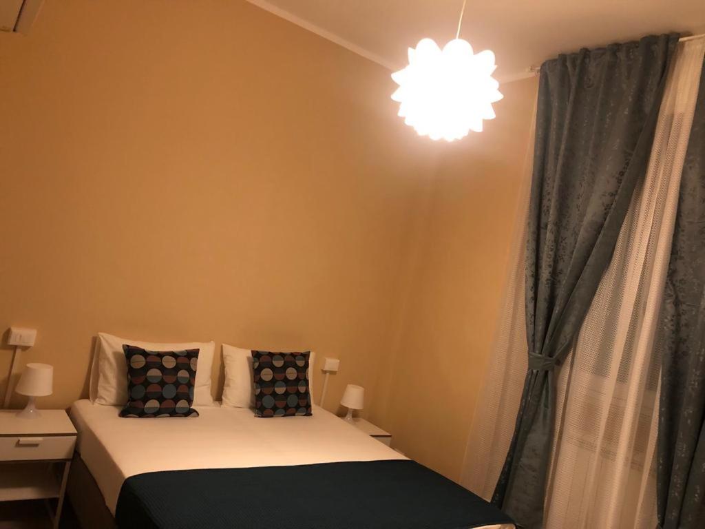 Posteľ alebo postele v izbe v ubytovaní PARADISE INN