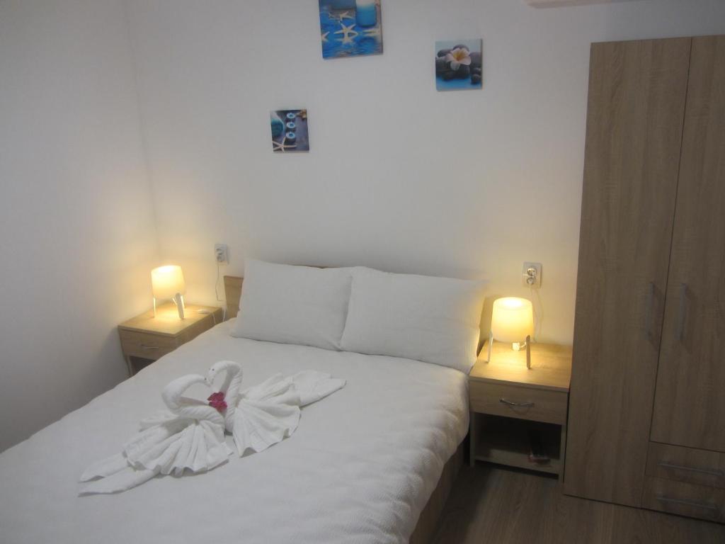 Postel nebo postele na pokoji v ubytování Casa Nicholas