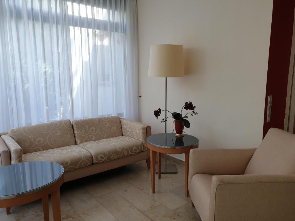Posezení v ubytování Hotel Rheinland