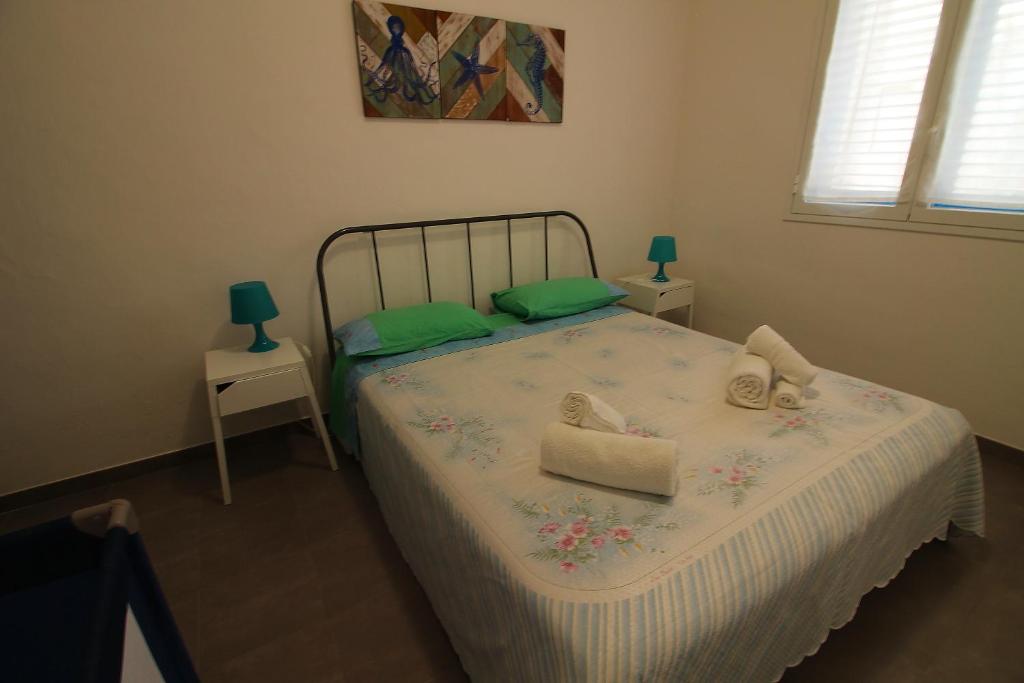 Posteľ alebo postele v izbe v ubytovaní Casa Bluet
