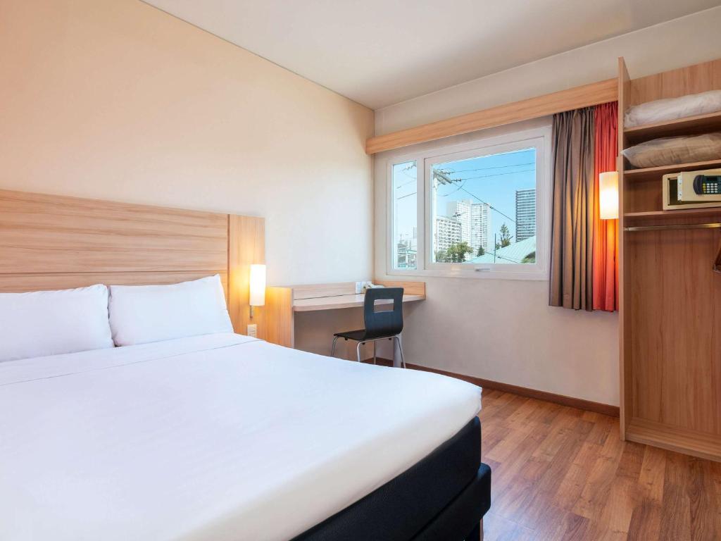 Cama o camas de una habitación en ibis Santiago Estacion Central