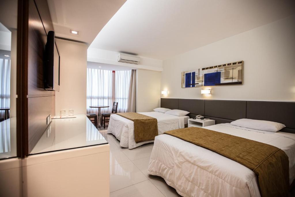 Quarto Deluxe com Cama de Casal ou 2 de Solteiro