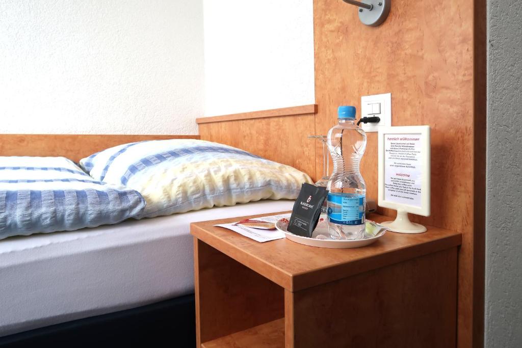 Postel nebo postele na pokoji v ubytování Budget Motel Self Check-In