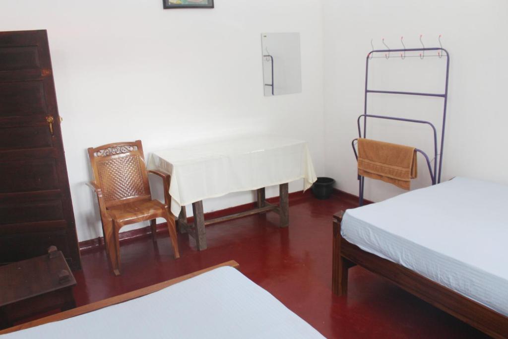 Postel nebo postele na pokoji v ubytování Grand Villa