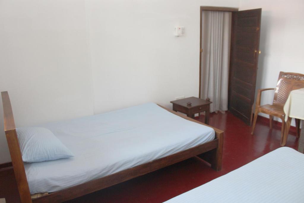 Postel nebo postele na pokoji v ubytování Grand Villa