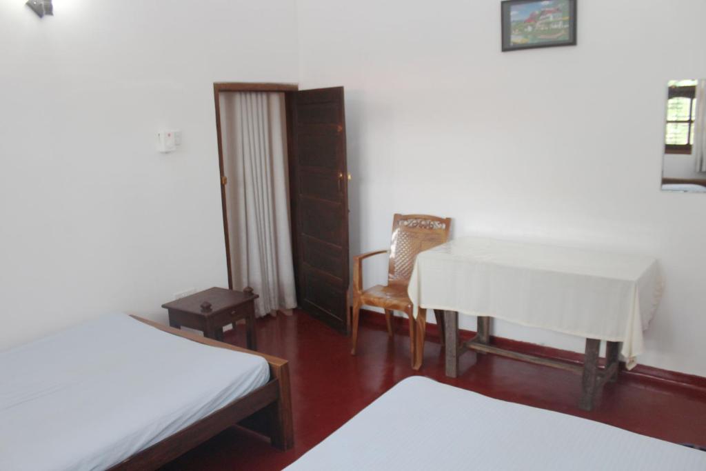 Postel nebo postele na pokoji v ubytování Grand Villa