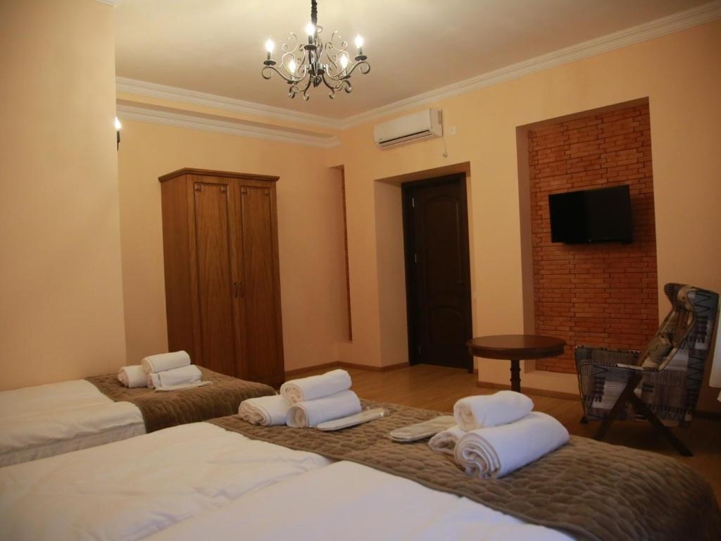 Postel nebo postele na pokoji v ubytování B&B rooms