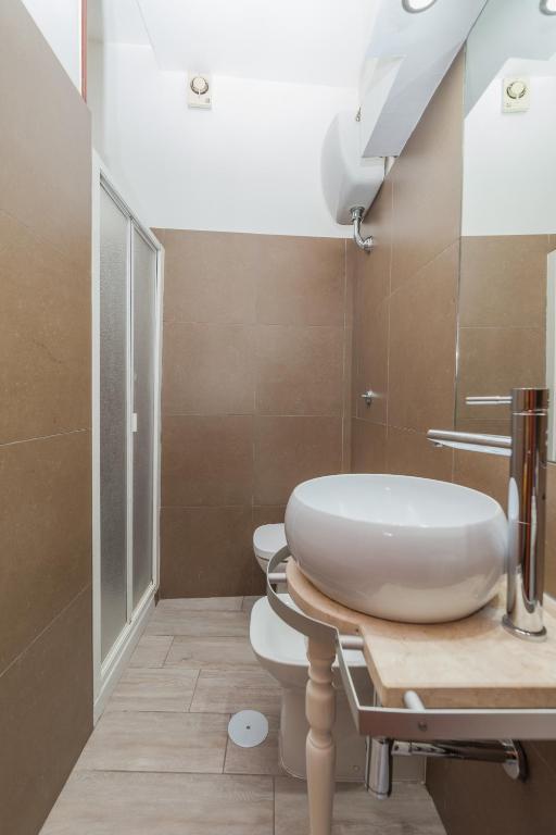 Koupelna v ubytování Albergo Della Corte