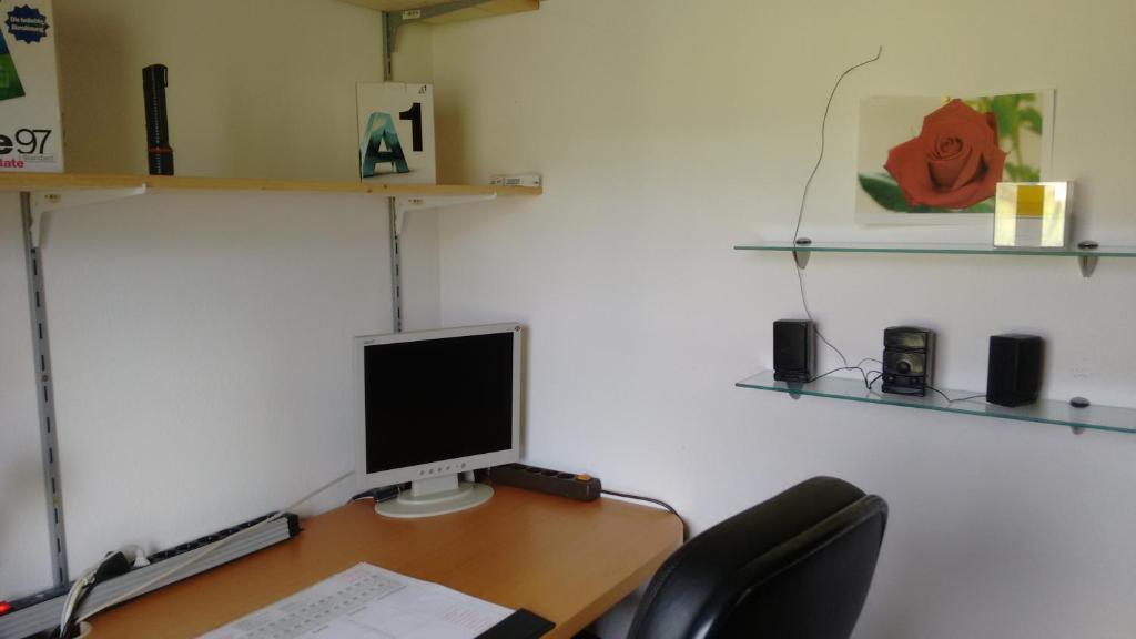 TV a/nebo společenská místnost v ubytování Haus Aria