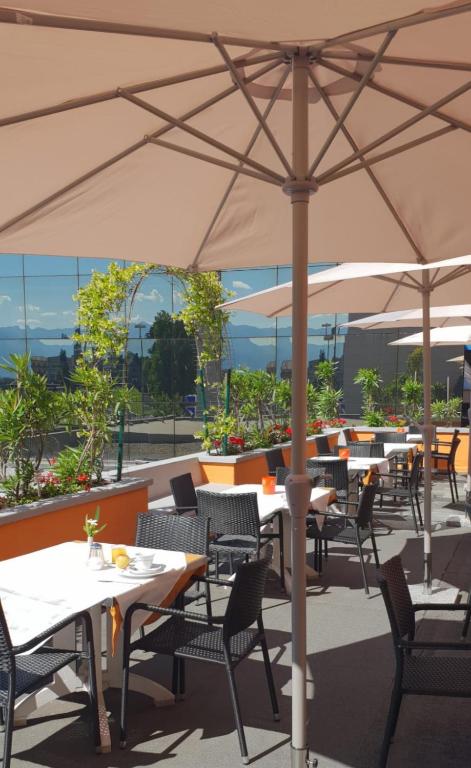 Un restaurante u otro lugar para comer en Hotel Garni Montaldi