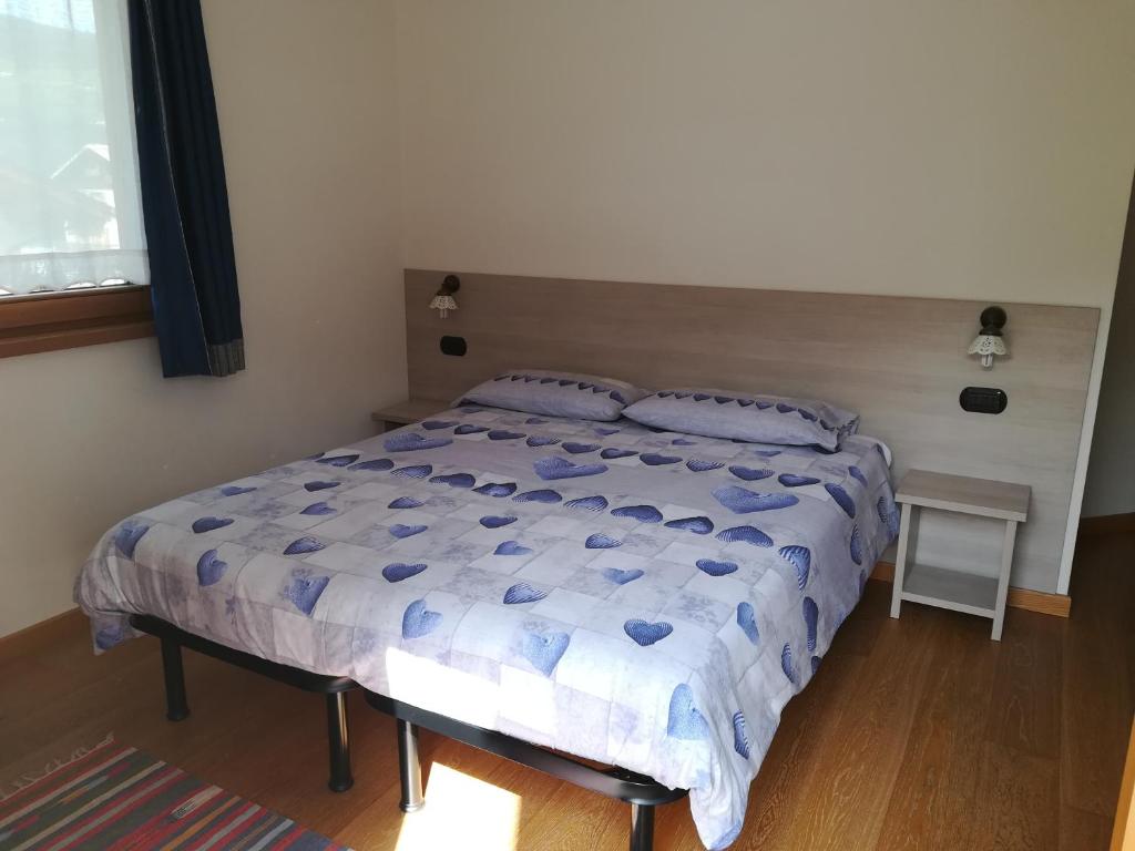 Postel nebo postele na pokoji v ubytování Casa Betty