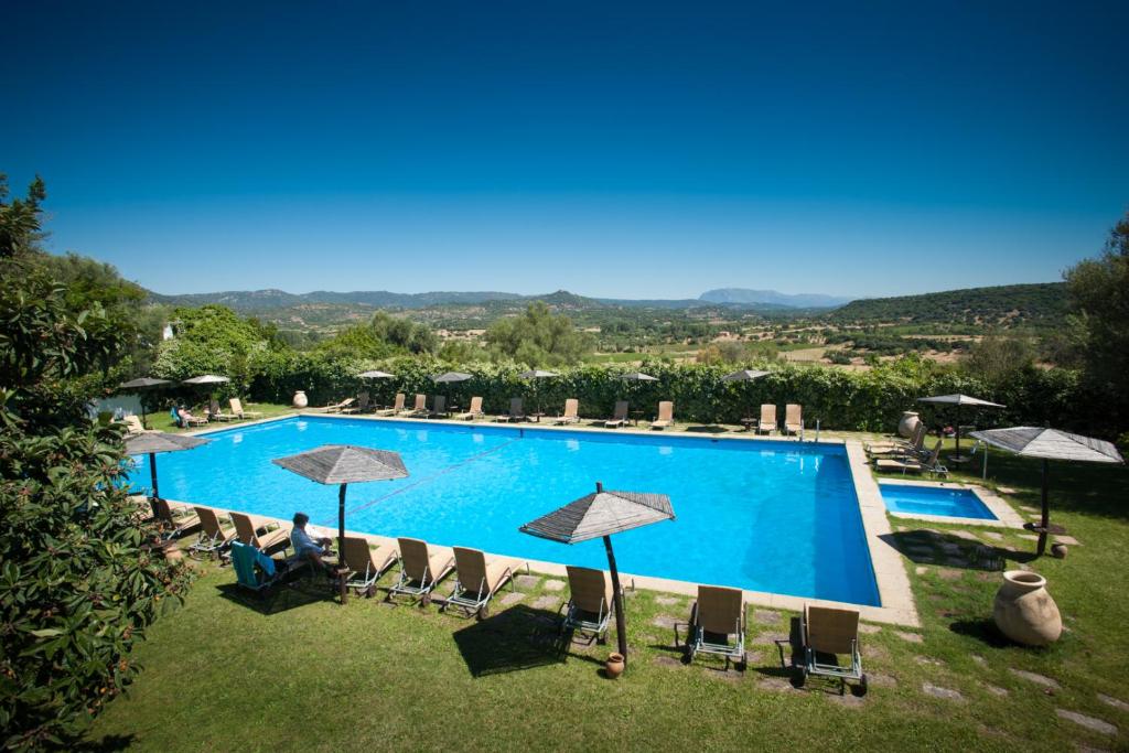 Bazén v ubytování Su Gologone Experience Hotel nebo v jeho okolí