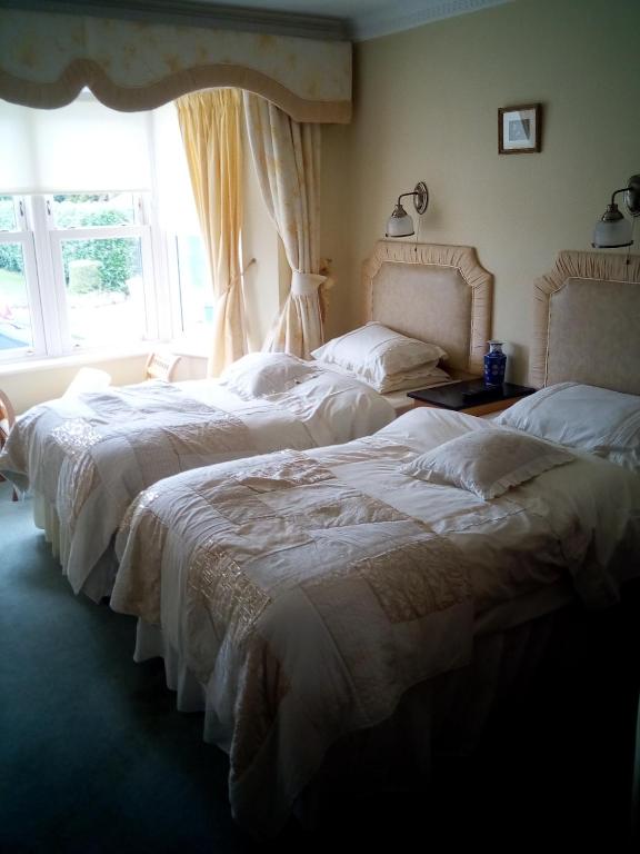 Postel nebo postele na pokoji v ubytování Rosemount B&B