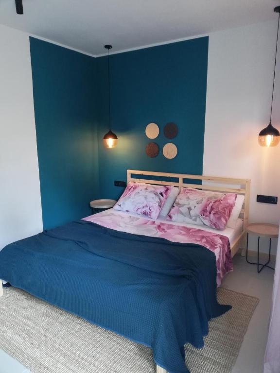 Łóżko lub łóżka w pokoju w obiekcie Apartments Pržina