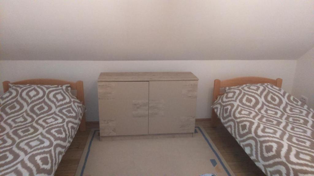 Postel nebo postele na pokoji v ubytování Apartman Sunce Zova