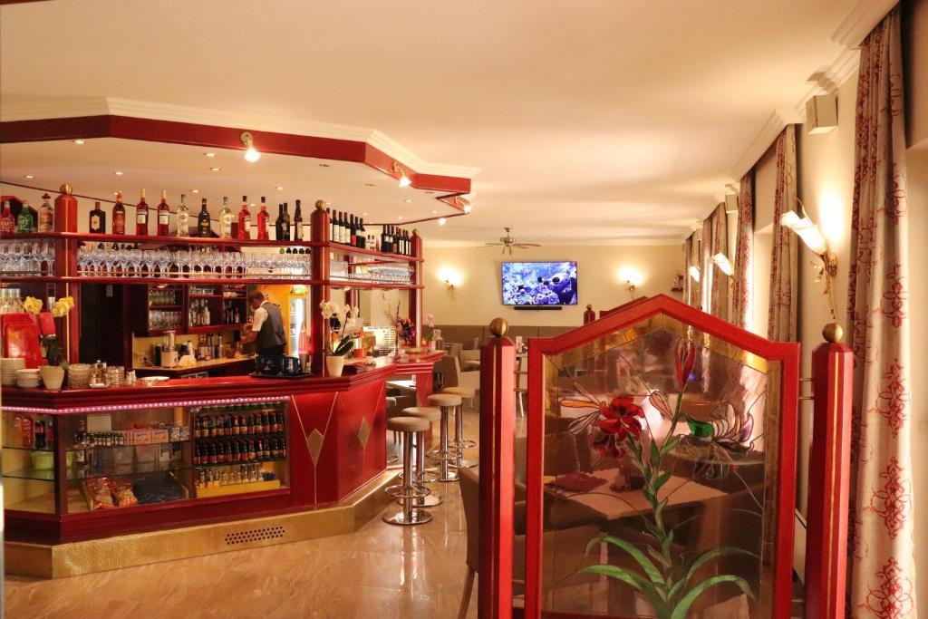 Lounge nebo bar v ubytování Strandhotel Orchidee