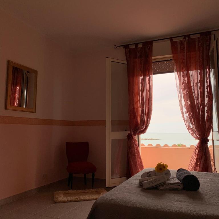 A bed or beds in a room at Sunrise
