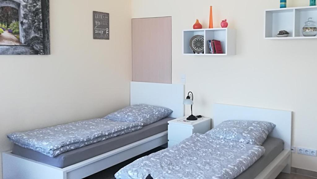 Säng eller sängar i ett rum på Helles 1-Zimmer-Apartment in Hemmingen/Hannover