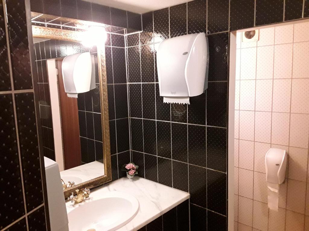 Koupelna v ubytování Hotel Feiler