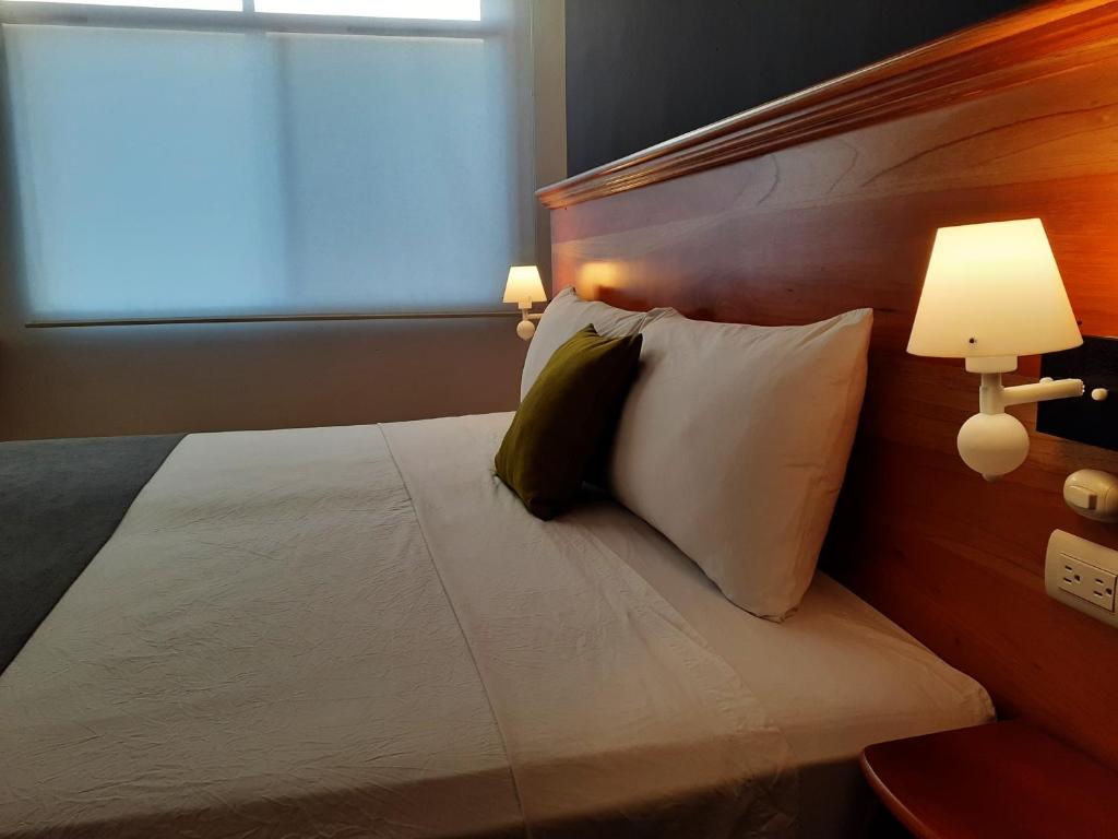 Postel nebo postele na pokoji v ubytování Casa D´Cristhi